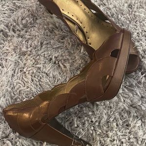 Bronze platform heels.